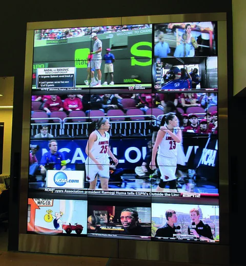 Three tall interactive display towers in the ESPN lobby