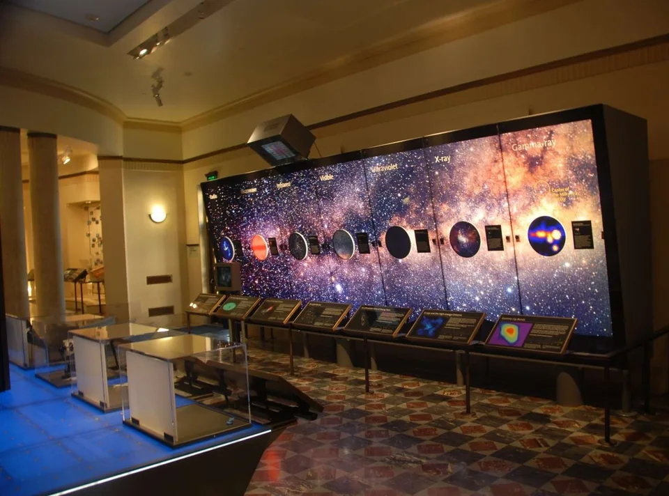 Illuminated astronomy exhibit and interactive viewing stations at Griffith Observatory